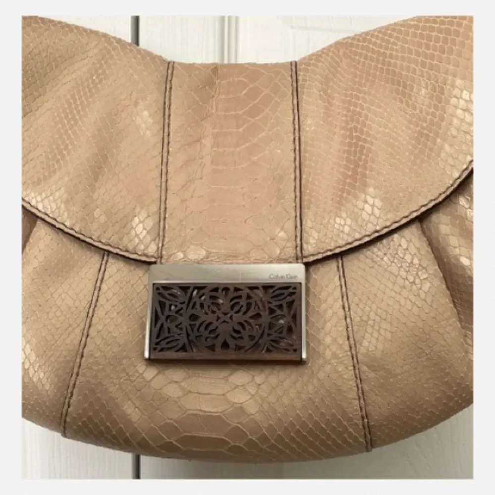 Calvin Klein Vintage Hobo Shoulder Bag with Carved Wood Flap Closure